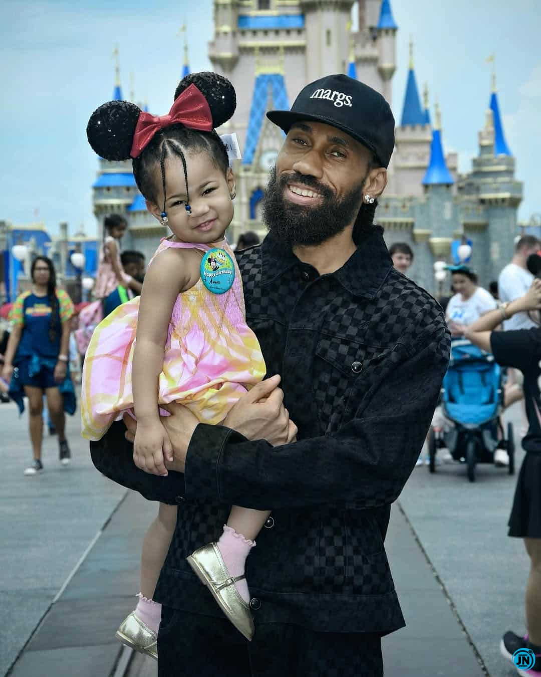 Phyno and daughter.